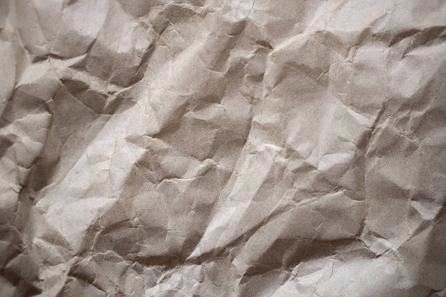 "Close-up Texture of Beige Crumpled Paper"