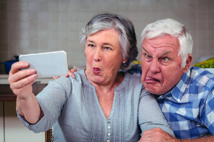 Funny Faces Of Elders Doing Selfie wallpaper